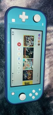 Nintendo Switch Lite Turquoise Handheld Console With Dark Blue Cover