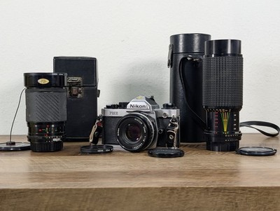 Nikon FM2 w 50mm 1.8 and Vivitar 28-105mm Macro and Albinar 70-300mm - Excellent