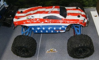 Traxxas 1/10 Scale Brushless E Revo Truck With Red White Blue Body