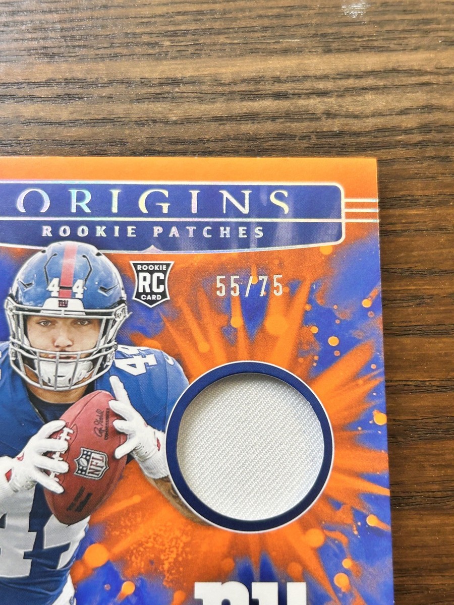 2025 Panini Origins Cam Skattebo SP RC Orange-White Patch /75