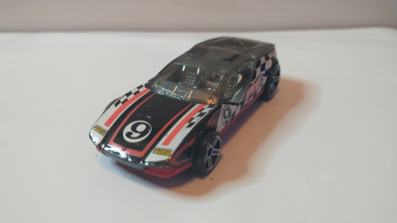 HOT WHEELS 2011 #12/15 LA FASTA - TRACK STARS BLACK 77/244 DIECAST TOY CAR