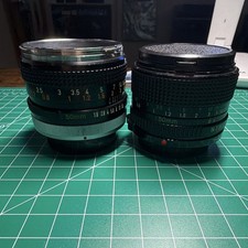 Two Canon FD 50mm Lenses, One FDN and one FD