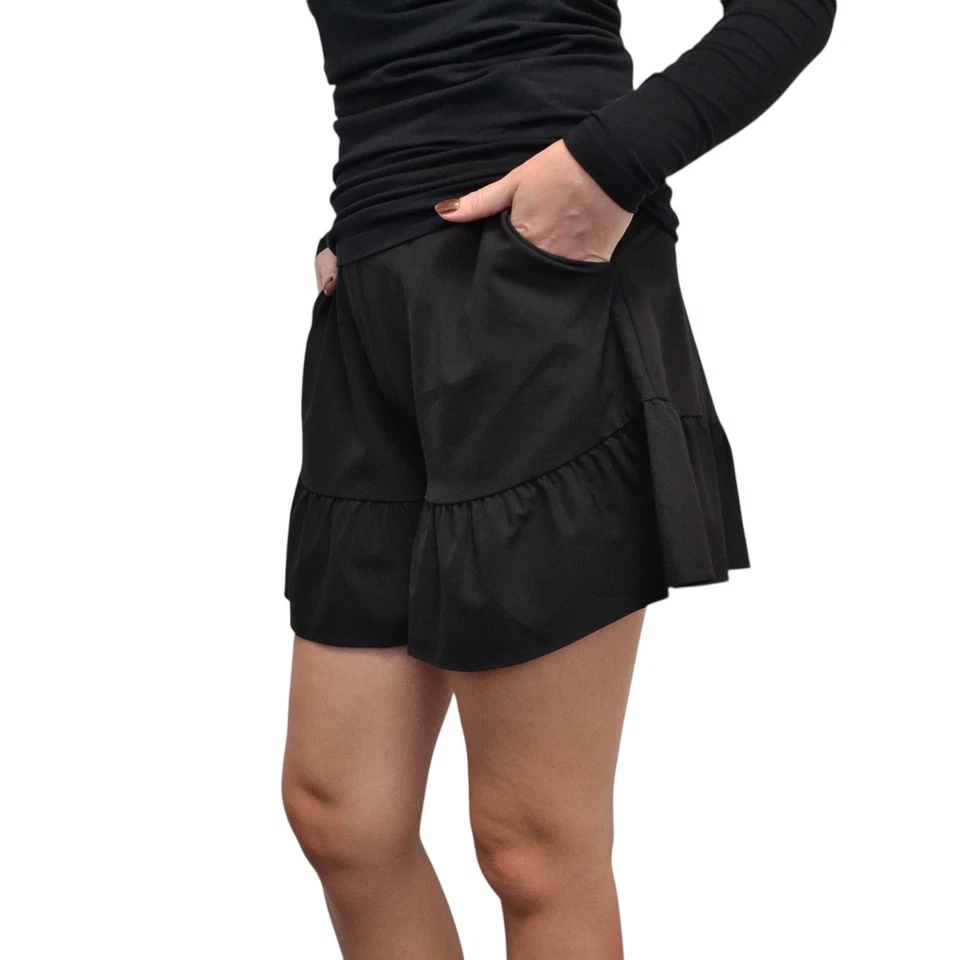 Pantalones cortos para mujer Moschino Boutique Designer con volantes negros talla US 4 GB 6 F 34 I 38 Foto 2 de 4