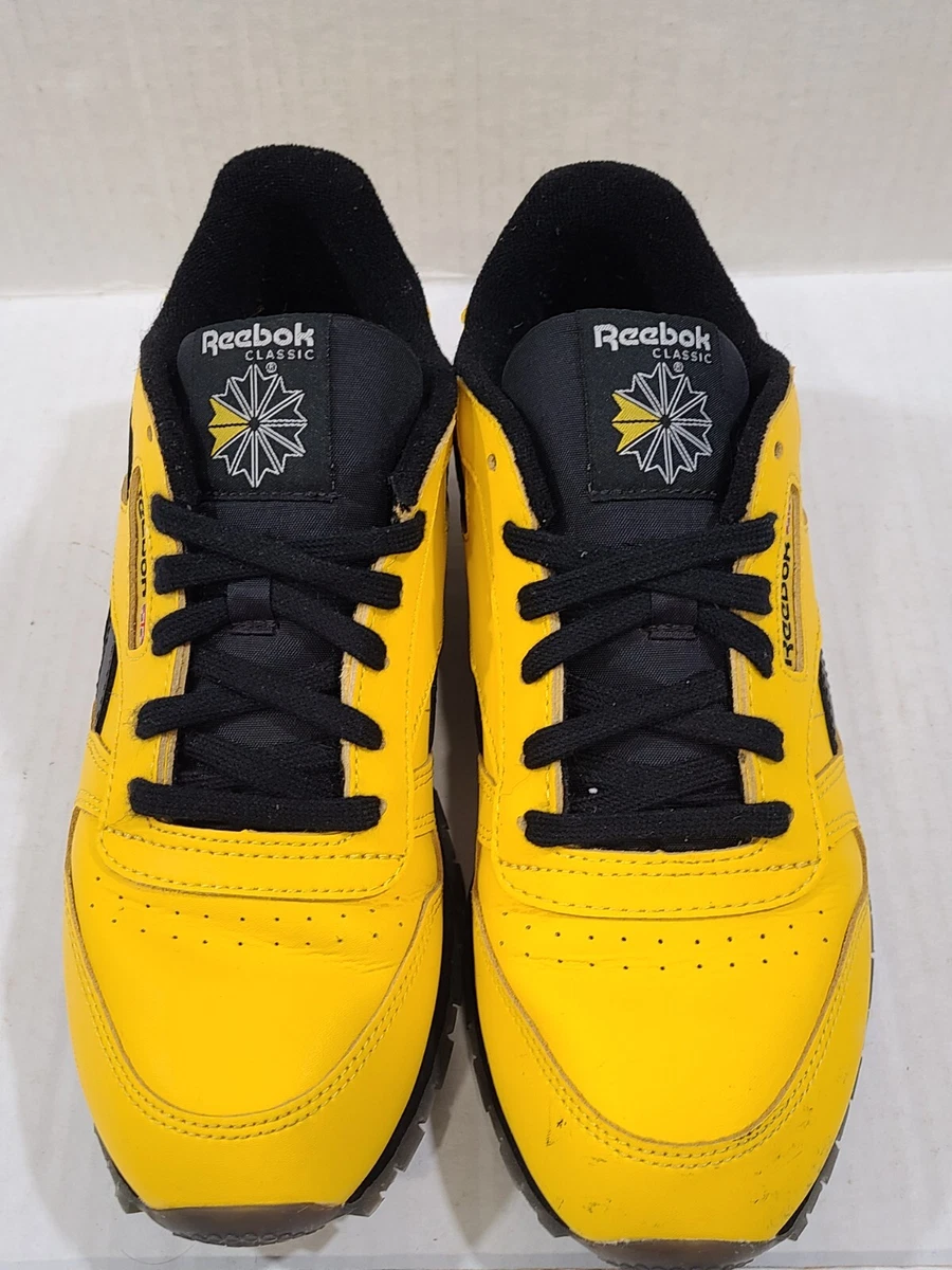 Reebok classic best sale black and yellow
