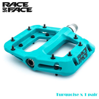 turquoise bike pedals