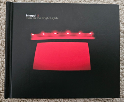 Interpol - Turn On The Bright Lights 10th Anniversary Edition Book 2 CD/1 DVD