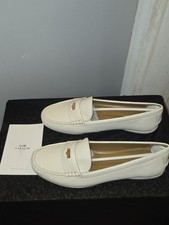 Womens "Coach" penny loafer. Pebble grain leather, size 9.5B womens. New in box