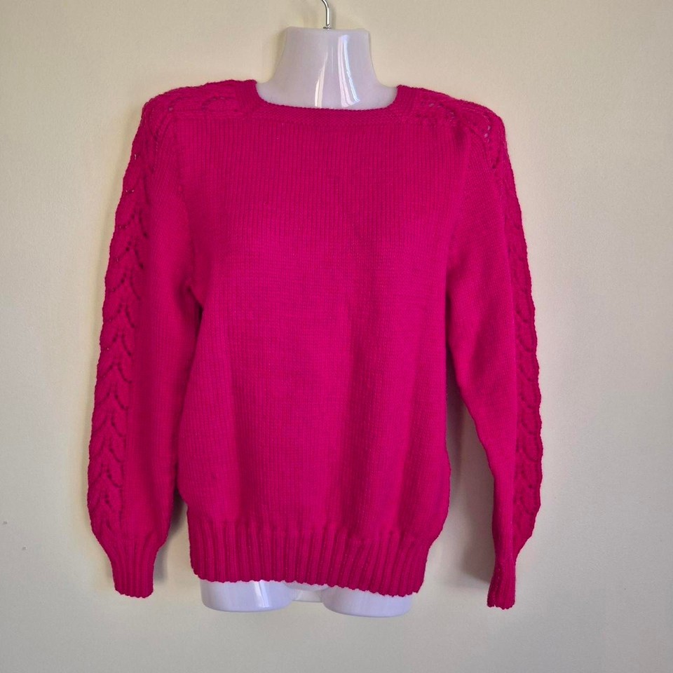 Handmade pink jumper with cable knit sleeves