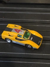AURORA XLERATORS YELLOW BLACK CHAPARRAL 2F  #4  HO SLOT CAR TJET