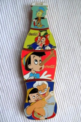 1 COCA COLA  PINOCCHIO PUZZLE PIN BOTTLE LIMITED EDITION 100 a