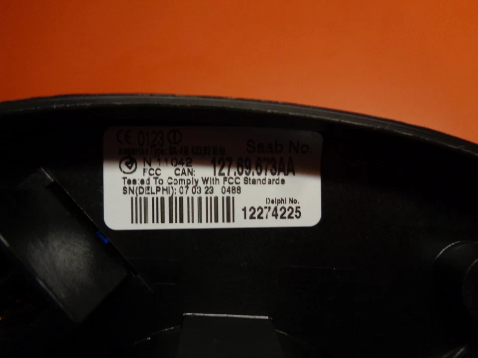 Módulo integrado central SAAB 9-3 CIM 2007 y un fob Foto 3 de 4