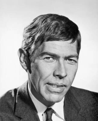 Close-up portrait of American actor James Coburn He wears a sui - 1965 Old Photo