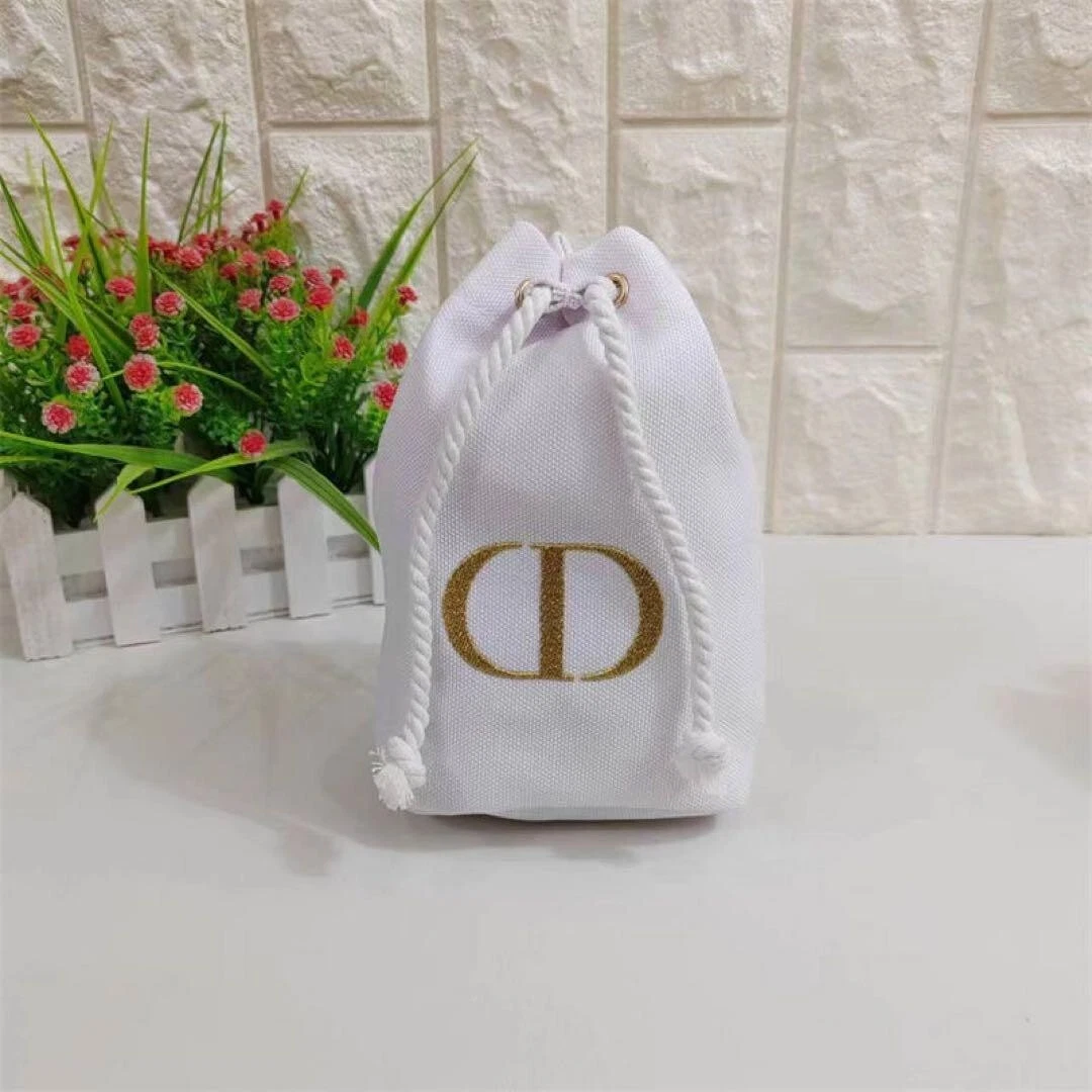 Christian Dior Pochette à cordon en sergé blanc cassé sac seau à maquillage logo CD neuf