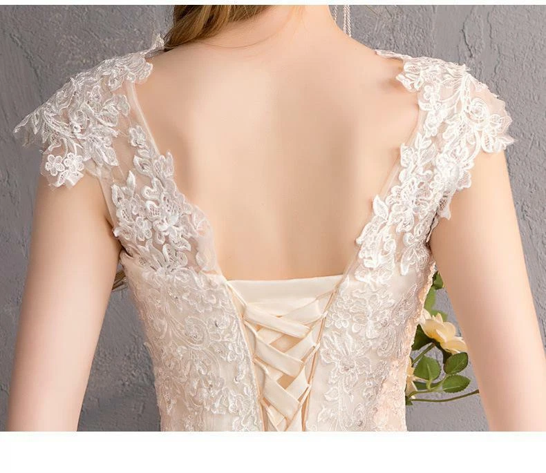 OFF WHITE Abito da sposa a sirena scollo a barca pizzo applicazioni paillettes coda di pesce