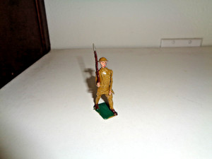 Rare Original Warren U.S. Soldier Marching with Rifle at the Slope