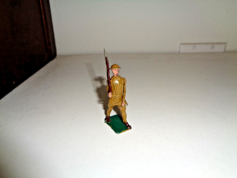 Rare Original Warren U.S. Soldier Marching with Rifle at the Slope