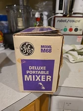 General Electric Hand Held Mixer model: M68 NOS,never opened, assuming its white