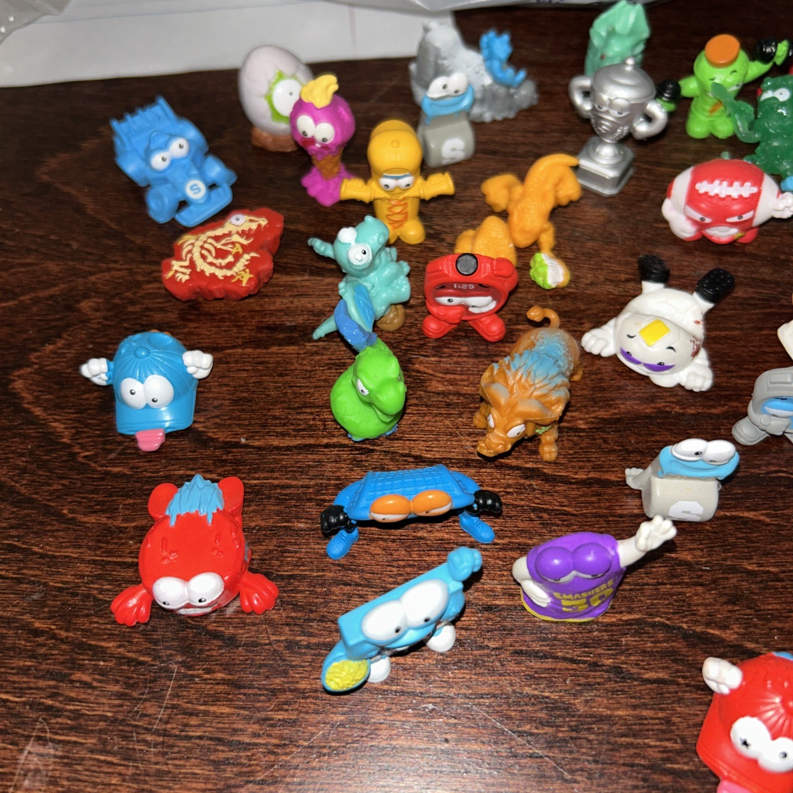 Zuru Smashers Mixed Lot of 28 Minifigure Mini Figures Sports Vehicles ...
