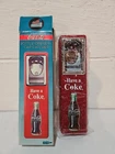 Vintage 1997 Coca-Cola wall mount bottle opener /cap catcher with box