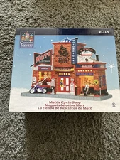 Carole Towne Christmas Village Matt’s Cycle Shop