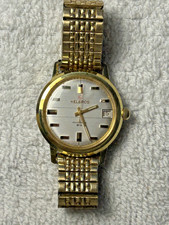 Helbros gold vintage 34 mm Swiss made “Invincible” Manual Wind Watch with date