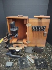 1920’S BAUSCH & LOMB MICROSCOPE W/ORIGINAL WOODEN CASE AND OPTICS