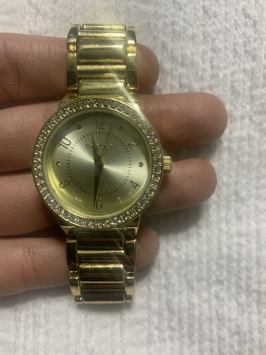 Reloj bebe dorado con cristales talla nica