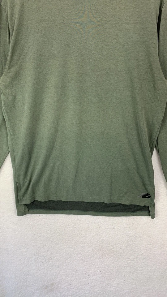 Camiseta New Balance Heathertech Hombre Mediana Hunter Verde RWT Manga Larga Foto 3 de 4