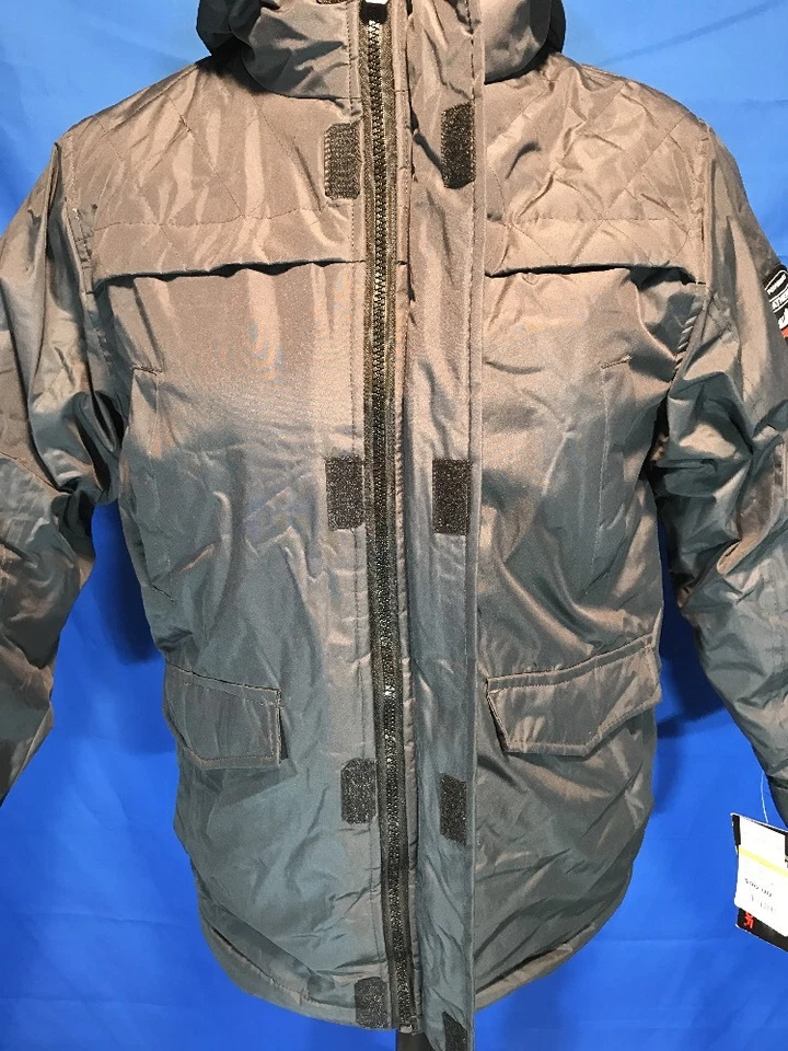 CHAQUETA A CUADROS PARKA RIPSTOP RADIANCE IMPERMEABLE PARA NIÑO GRIS POLAR MEDIANA $90 Foto 3 de 4