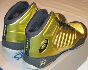 asics jb elite black and gold