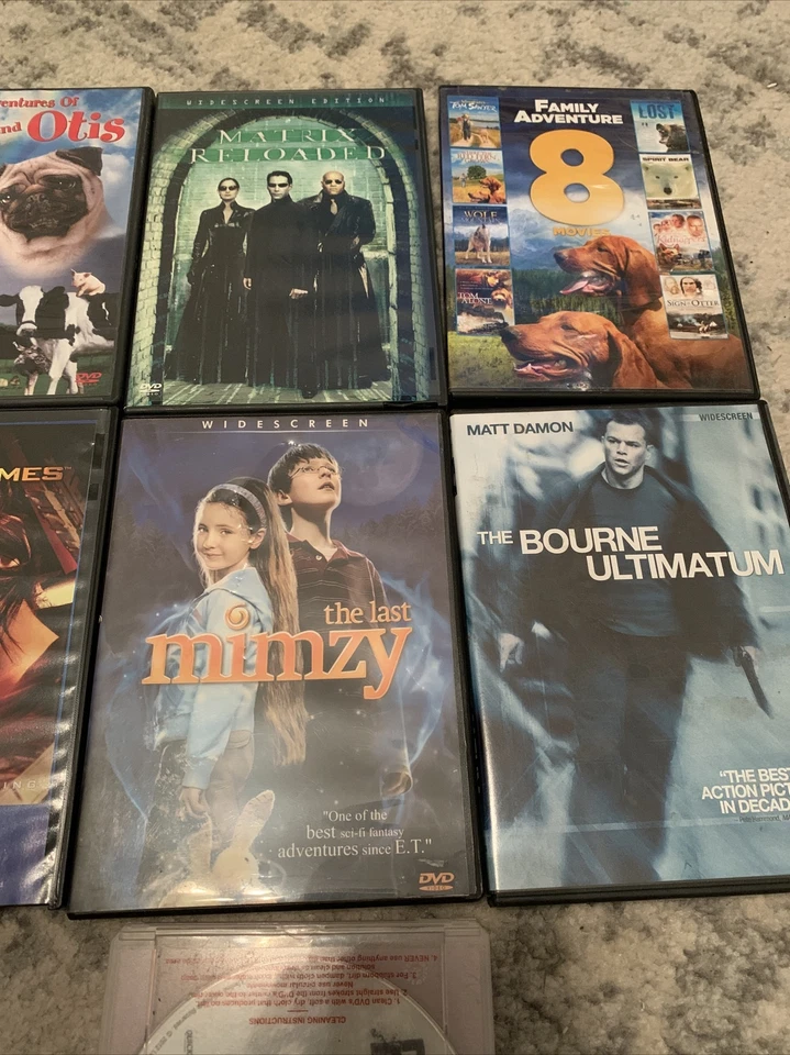 Lot Of 7 Movies DVD Matrix Hunger Games Bourne Mimzy Milo & Otis - Image 3 of 4