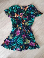 BNWT SIZE MEDIUM MULTICOLOURED SHORT SLEEVE PLAYSUIT