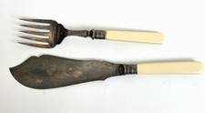 Antique EPNS fish serving knife and fork set Celluloid or Ivorine late Victorian