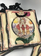 Twelve 1994 Mary Engelbreit 4.5in X 4in. X 2in. Mini Gift Bags. New/Old Stock