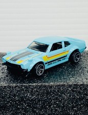 2023 HOT WHEELS CUSTOM FORD MAVERICK 2/10 Muscle Mania Blue New Loose