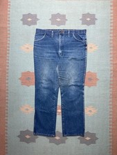 Vintage 80s rustler jeans worn faded denim straight leg talon made in USA 37x30