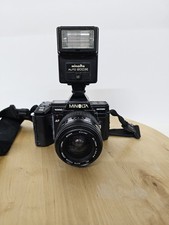 Minolta Maxxum 7000i SLR Film Camera with 35-70mm and Auto 200x flash