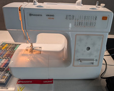 Husqvarna H Class E10 Sewing Machine 20 Stitches. Swiss plug with adapter