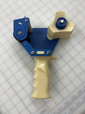 Handheld packing tape gun