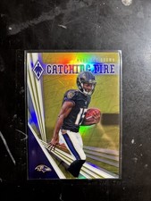 2019 Panini Phoenix - Catching Fire Marquise Brown #1 Yellow /75 (RC)