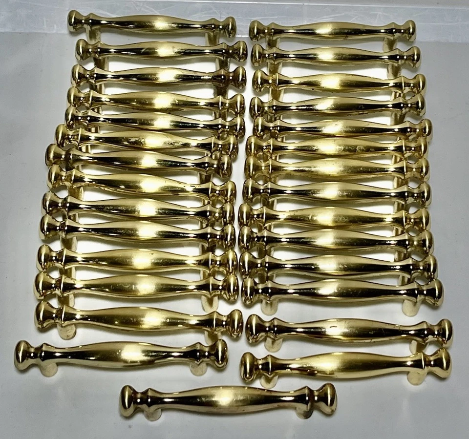 "Tiradores de manija de gabinete de arco de latón esterlina Amerock 854-I de colección 29 piezas" Foto 2 de 4