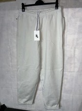 Image of mens nike casual Loose zip pocket joggers. new tagged size small