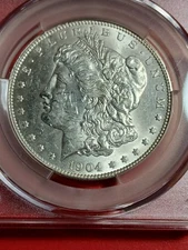 1904-0 MORGAN SILVER DOLLAR . CAC APPROVED. MS 61. BU. BEAUTY