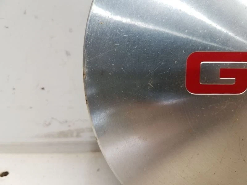 GMC Sonoma 2000 tapa central de 5 orejetas *plateada* grado C Foto 4 de 4