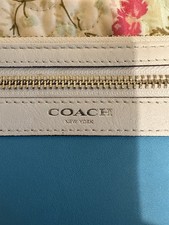 Coach Women s Blue & Beige Solid Zip Wristlet...