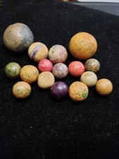 16 ANTIQUE CLAY MARBLES LARGEST 27MM