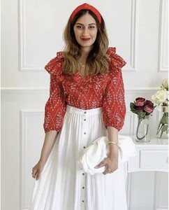red ruffle top blouse