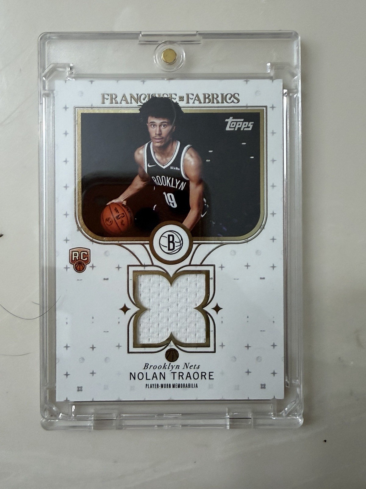 2025-26 Topps - Franchise Fabrics Nolan Traore #FF-NT (MEM, RC)