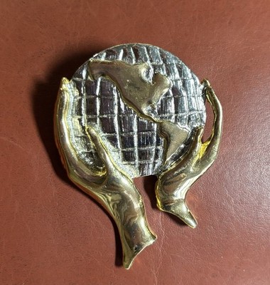 He's Got the Whole World in His Hands Gold And Silver Toned Vintage Brooch