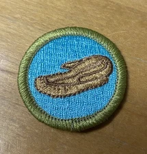 BOY SCOUTS LEATHER WORK  MERIT BADGE TYPE L "SINCE 1910" BACKING NEW